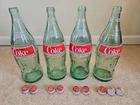 vintage lot of four 32 fl oz (one quart) Coca-Cola Coke pop soda bottles caps