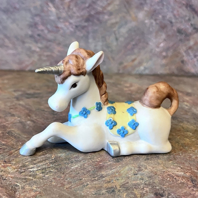 White  Porcelain Lying Unicorn Figurine w/ Blue Flower, Approx 4 in