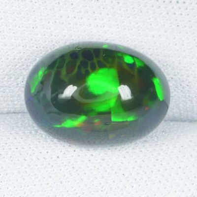 6.10 ct  AWESOME GREEN RED MULTI FLASHING   NATURAL ETHIOPIAN OPAL  See Vdo !