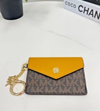 - Brand New - Michael Kors Kara Signature Small Flap Key Ring Card Case,Marigold