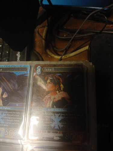 FINAL FANTASY TCG OPUS 1 SQUALL FOIL 9-027H - Picture 2 of 2
