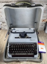 Olympia Deluxe Manual Portable Typewriter With Case thumbnail