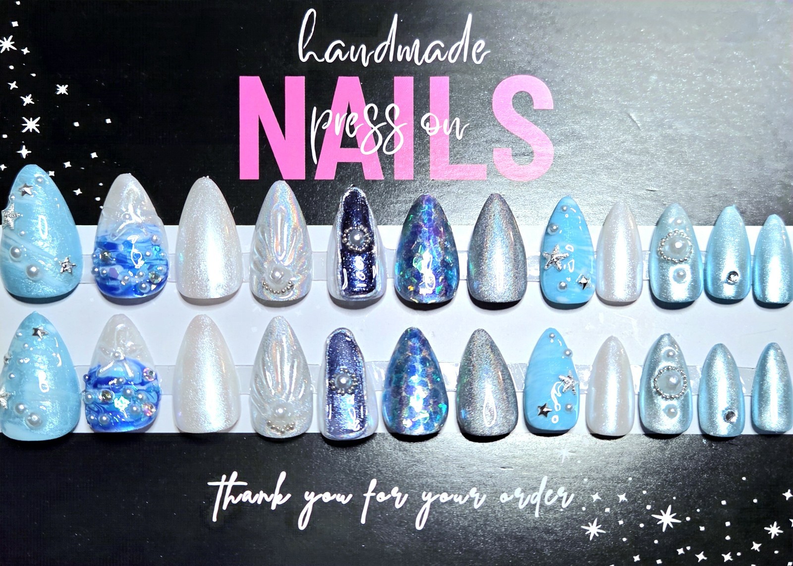 Press on nails fait main bleu océan pour sublimer vos soirées d'été