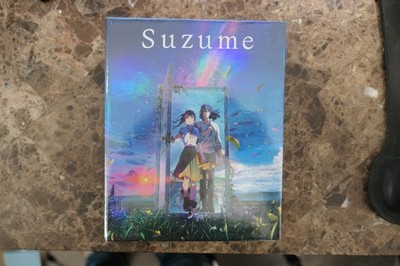Suzume (Limited Edition) BLU-RAY/DVD 3-Disc with 60 Page Art Book & 4 Art Cards