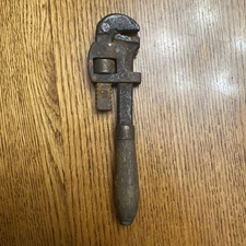 Vintage Pexto pipe wrench, 7 inches long. Wood handle