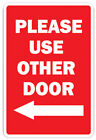 Please Use The Other Door With Left Arrow Novelty Sign office entrance entry