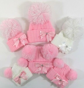 pink bobble hat baby