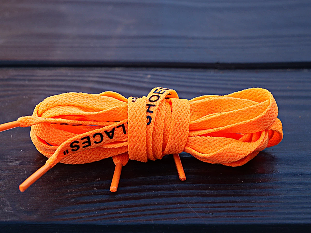 Off white laces orange top