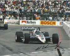 AL UNSER JR. INDY CAR DRIVER SIGNED 8x10 PHOTO INDIANAPOLIS 500 CHAMPION E w/COA