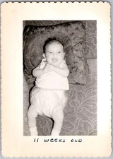 Vintage Snapshot Cute Baby Smiling On Cushion 1950s