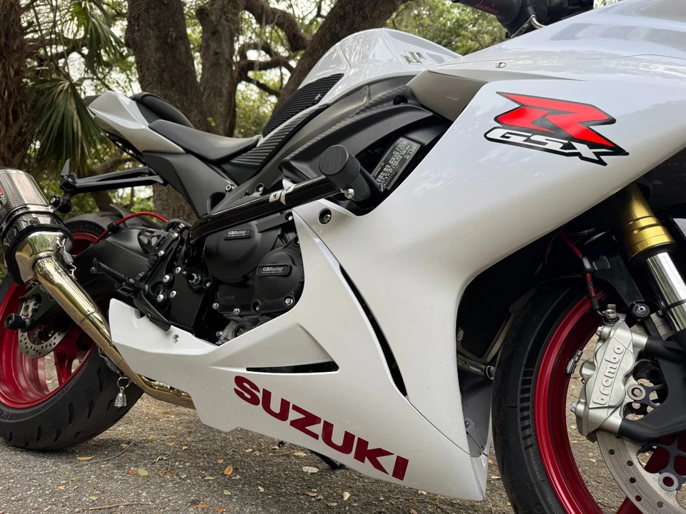 Suzuki GSXR 600/750 2011-2025 sin corte riel de carrera deslizadores jaula de choque - en punto Foto 2 de 4