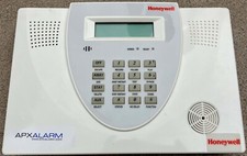 ADEMCO LYNXR-I home security system made by Honeywell with two remotes.