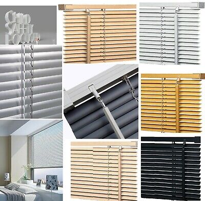 Venetian blinds on the window frame