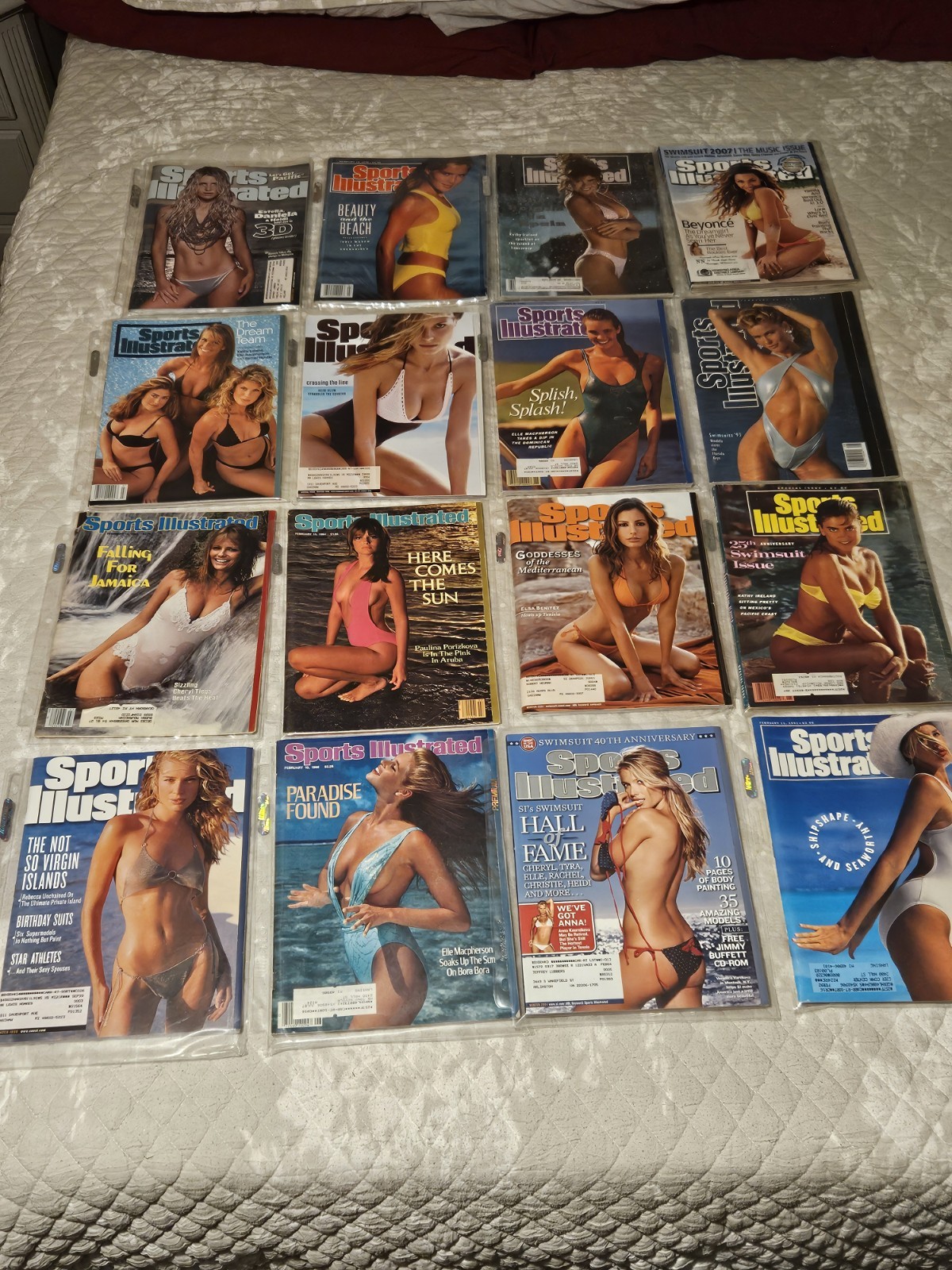 LOTTO Lot of 16 Sports Illustrated Swim Suit Editions Very Cool Collection! In Case!