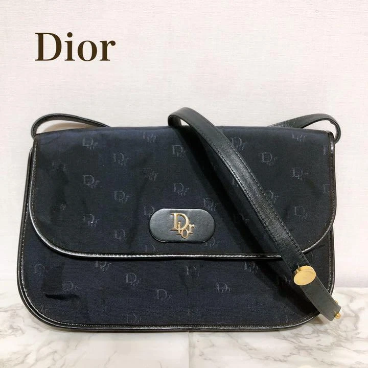 Sac bandoulière vintage motif logo Christian Dior or noir