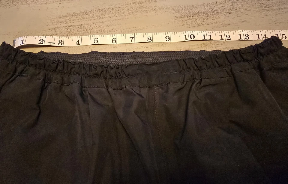 Pantalones de golf FootJoy DryJoys para mujer medianos negros impermeables cremallera/tobillo a presión Foto 4 de 4