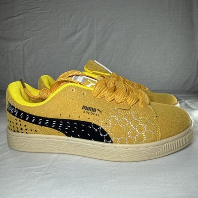 Women's PUMA casual low-top lace-up sneakers in yellow and black (size 6.5).