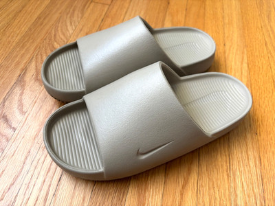 Nike calm Slides Men Size 6 Women Size 7 Tan Used