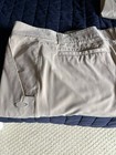 Oakley light tan golf pants 40 x 32 , NWOT , stylish slot in hem — photo 1