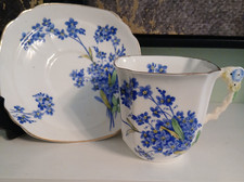 Vintage Royal Stafford Genuine Bone China cup and saucer "Forget Me Not" Pattern