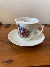 ANTIQUE POTTERY EARLY 19TH C FLORAL DECORATED MOUSTACHE CUP AND SAUCER