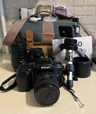 Nikon F50 SLR Film Camera Sigma.  28-105/100-300/35- 80mm Lens tripod Bag ex con