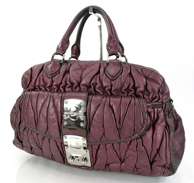 Authentique sac à main en cuir matelasse violet MIU MIU #62643 - Photo 1/4