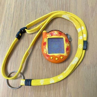 BANDAI Tamagotchi Plus Akai Orange Leaf Virtual Pocket Game Body Only Loose Used