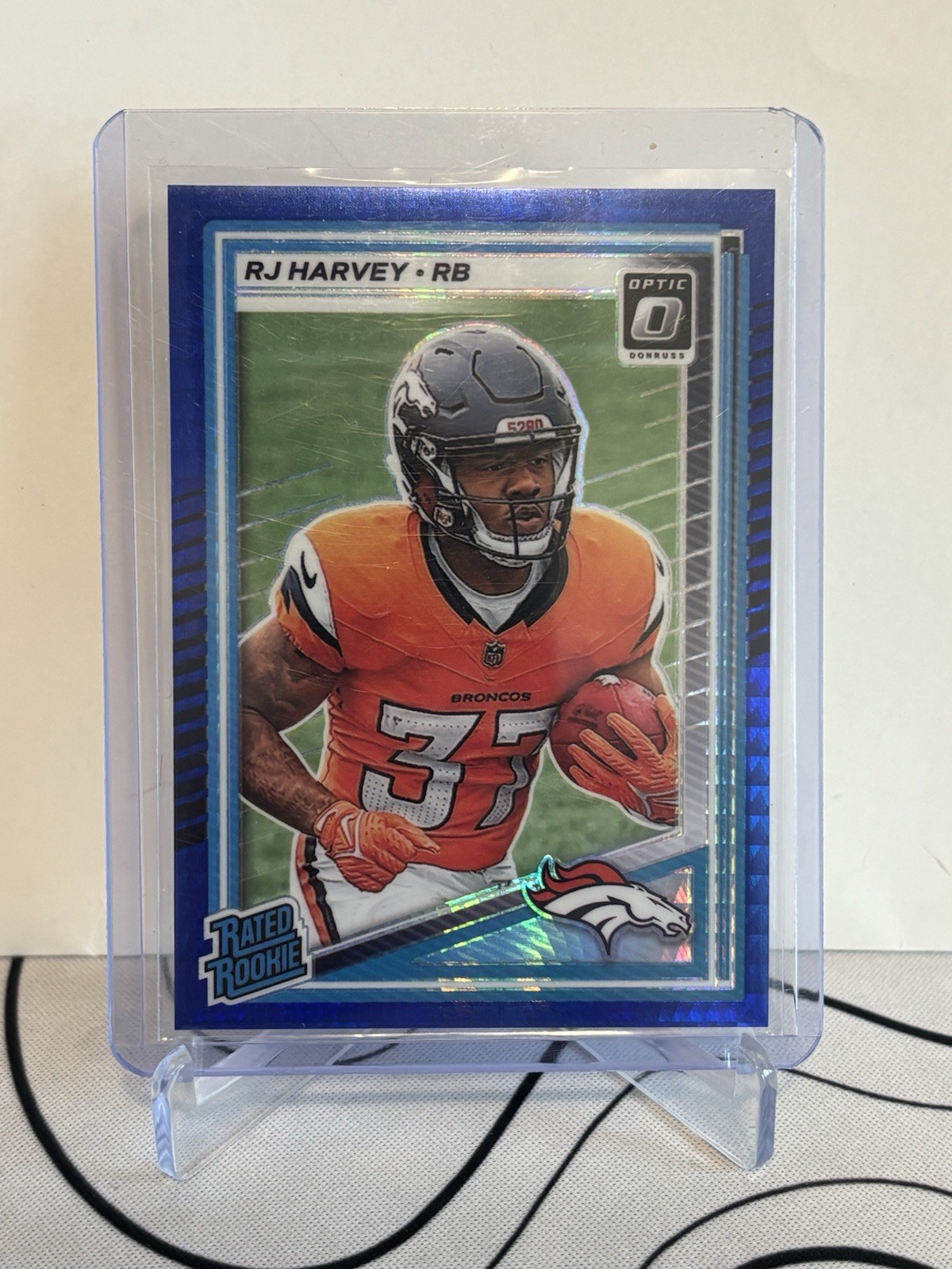 2025 Panini Donruss Optic - Rated Rookie RJ Harvey #208 Blue Hyper Prizm (RC)