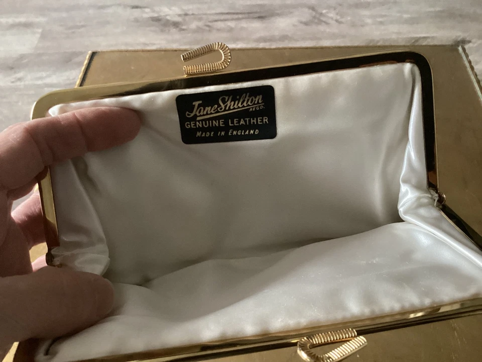 Pochette en cuir doré Jane shilton. Élégante. - Photo 2/4