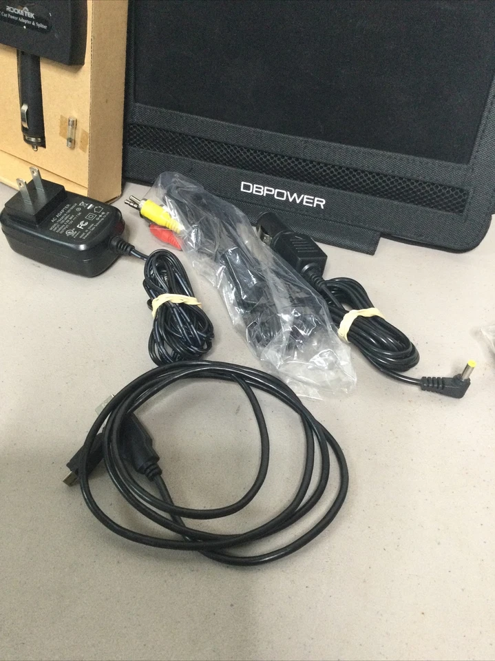 DBPower Model SY-03 10" Portable DVD Player With Remote, Cables And Accessory’s. - Image 4 of 4