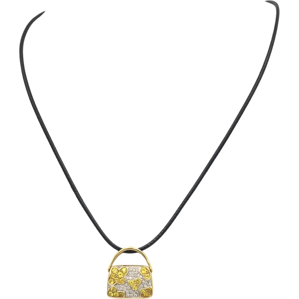 Colgante Cartera MOVADO Oro Amarillo Blanco 18k 0.72CT VS Diamante y Zafiro Amarillo Foto 2 de 4