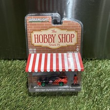 Greenlight The Hobby Shop 1999 Nissan Skyline R34 Green Machine 1:64 Diecast