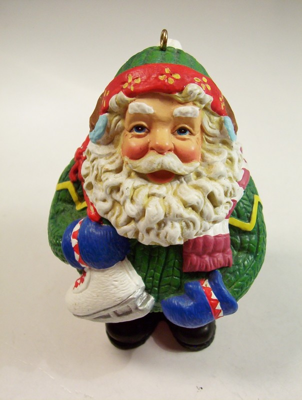 Christmas Ornament Santa Claus Figurine Green Sweater Ice Skates
