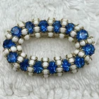 Vintage Milk Glass Brooch Blue Rhinestones Open Oval 1.75"
