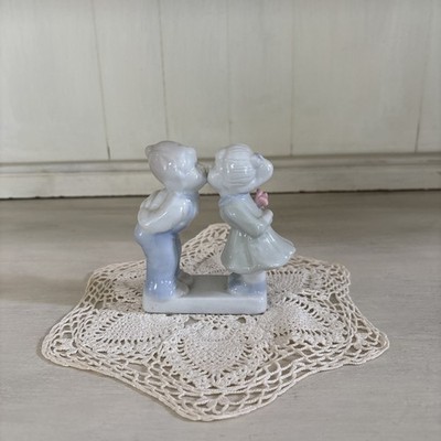 Kissing Boy and Girl with Flowers Ceramic Figurine. perfect for gift