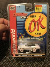 AUTO WORLD HO SCALE Electric Slot Car OK USED CARS 1969 PONTIAC GTO convertible