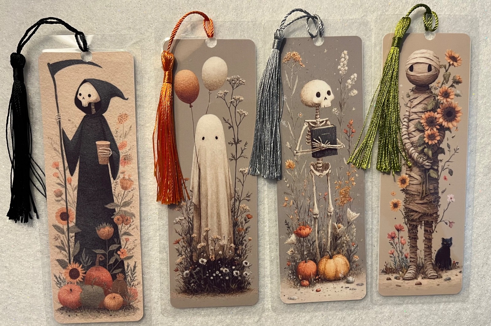 HALLOWEEN GHOST- SKELETON- MUMMY- GRIM REAPER 4 BOOKMARKS LAMINATED WITH TASSEL