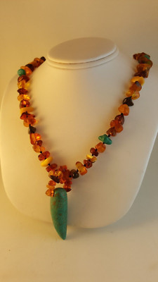 Turquoise butterscotch Baltic amber pendant necklace fetish dinosaur tooth shape
