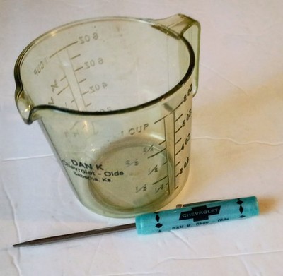 Old CHEVROLET  & OLDS Dealer SCREWDRIVER & MEASURING CUP...Sabetha, Kansas