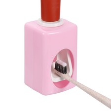 Single Slot Design Self-Adhesive Toothpaste Dispenser Pink