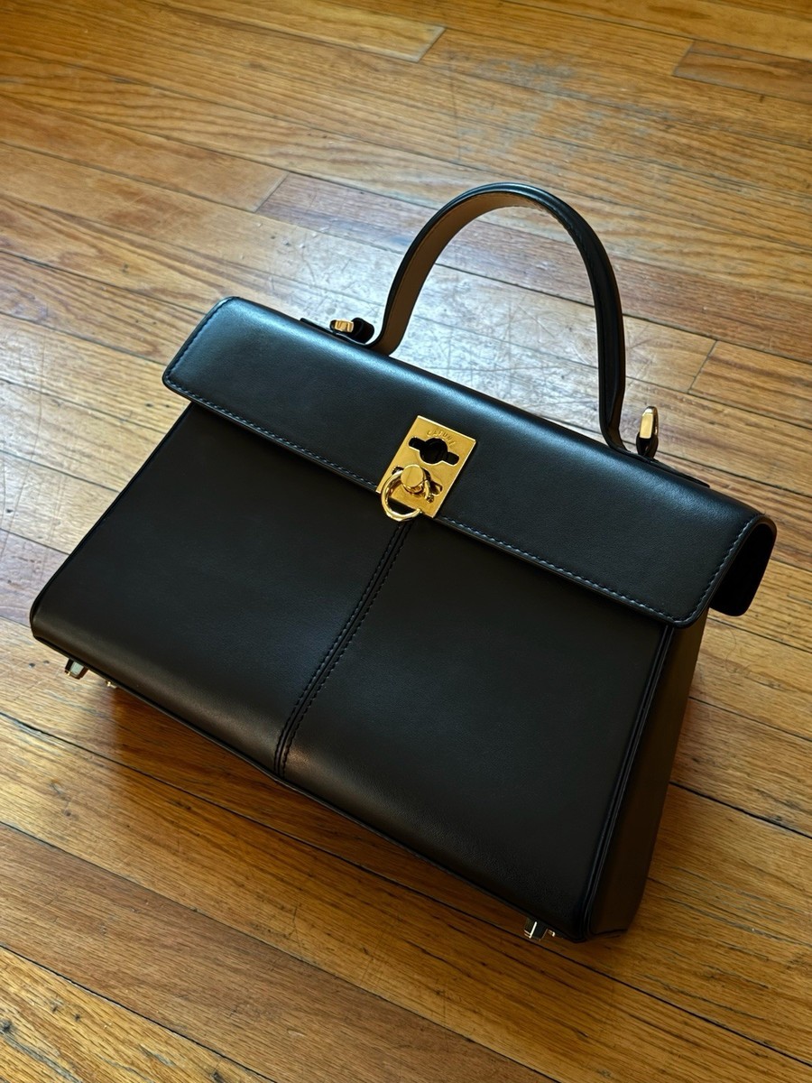 Black, smooth leather CAFUNE Stance Bag (Authentic) retails $760