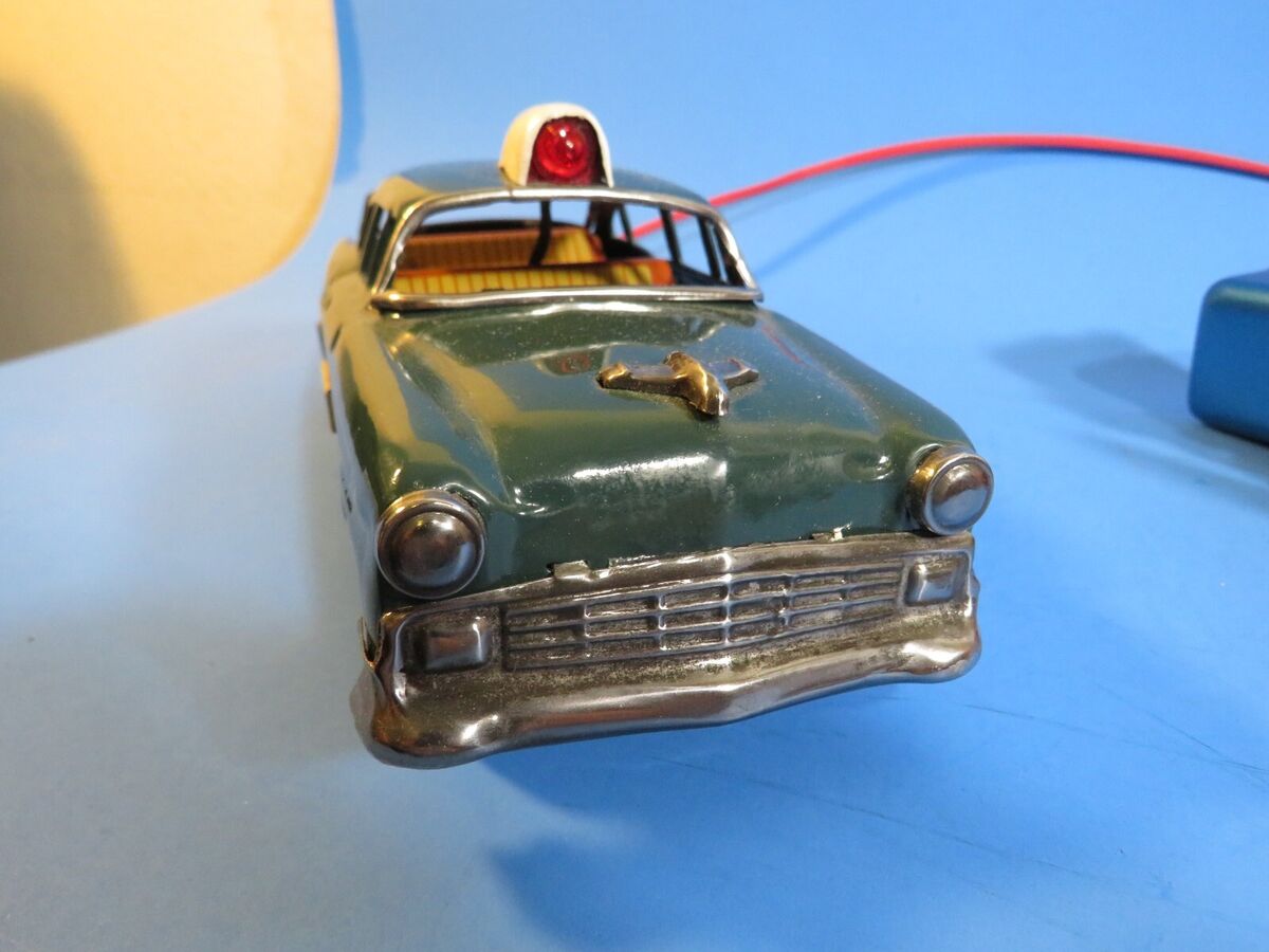 Vintage Tin Police Car 1956 Chevy Battery Operated, Line Mar Vintage Tin Police Car 1956 Chevy Battery Operated, Line Mar