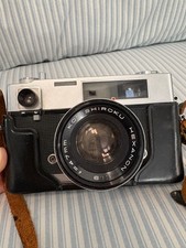 konica auto s 35mm film camera, Konishiroku Hexanon f 47mm lens w/ leather cover