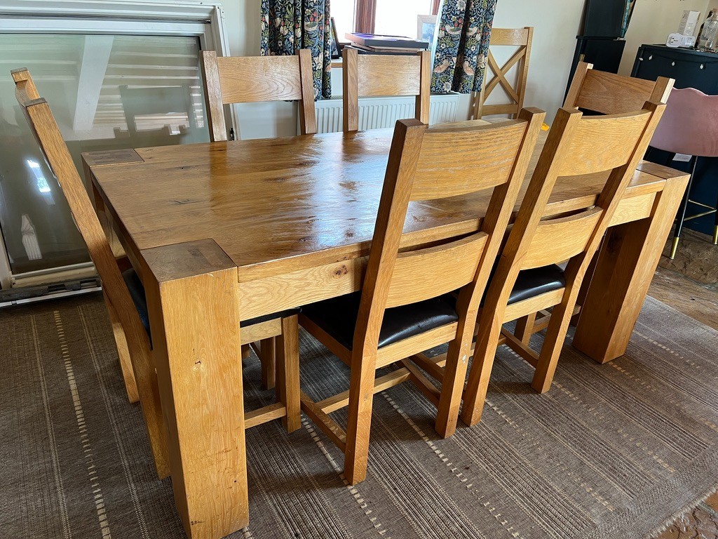 Solid Oak table and chairs