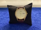 seiko gold tone watch- new battery- runs well day date 6533-8019!