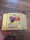 New ListingVintage Rare Legend Of Zelda Ocarina of Time N64 Gold Collectors Edition