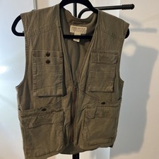 A vintage Banana Republic men's safari and travel vest in khaki or tan. Size S