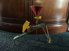 Vintage Wolverine Sandy Andy Tin Toy
