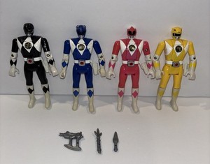 A collection of four, original 1993 Power Rangers figures. To include